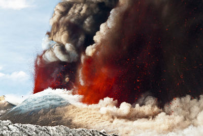 Scenic view of volcanic mountain against sky