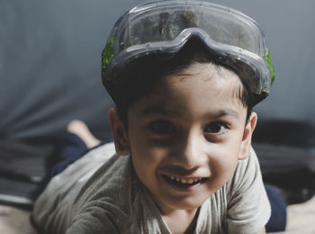 Close-up portrait of smiling boy