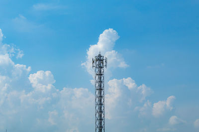 Low angle view of communications tower against sky