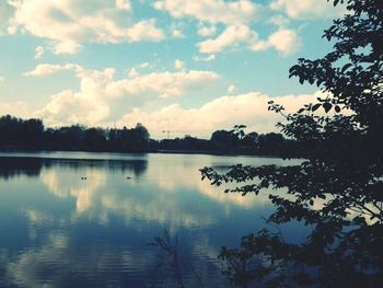 Scenic view of lake at sunset