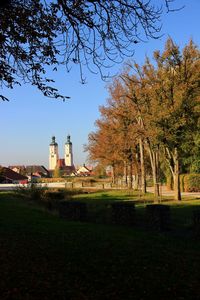 Park by building against sky