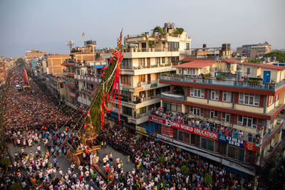 Devotees pull chariots as they take part in the festivities to mark the rato machindranath chariot.