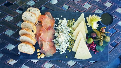 High angle view of charcuterie board on table