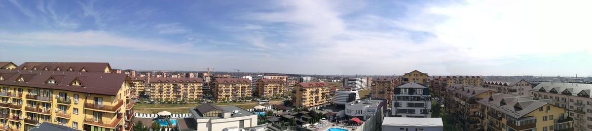 Panoramic view of cityscape against sky