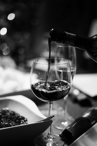 Close-up of wineglass on table