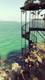 Spiral staircase by sea