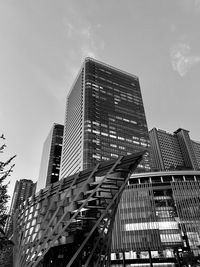 Low angle view of modern buildings against sky