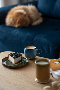 Close-up of coffee cup on table