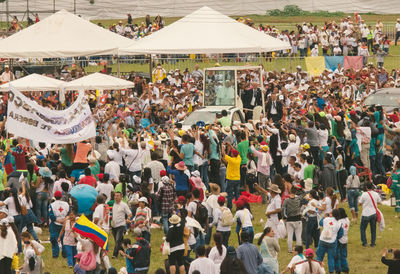 Crowd standing at town square