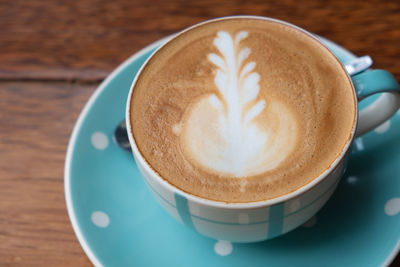 High angle view of cappuccino on table