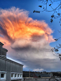 Low angle view of cloudy sky at sunset