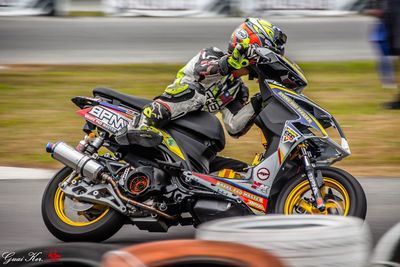 Bicycles riding motorcycle