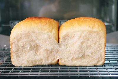 Close-up of bread on metal grate