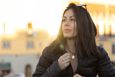 Portrait of mature woman smiling with unfocused background at florence, italy. 50mm lens