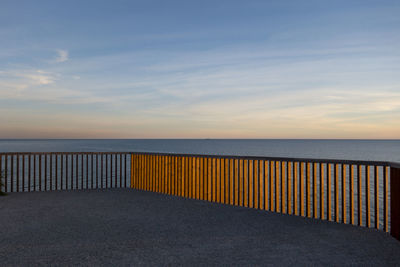 Scenic view of beach against sky during sunset