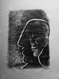Portrait of woman against wall