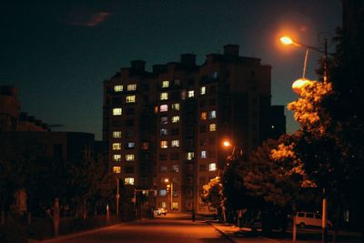 Illuminated street at night