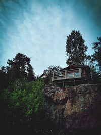 Low angle view of abandoned building against sky