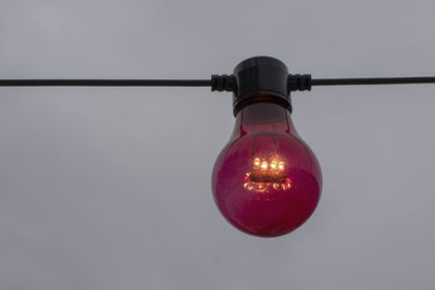 Close-up of illuminated light bulb