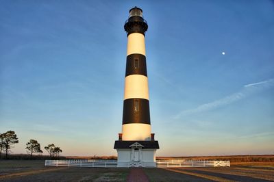 Lighthouse against blue sky