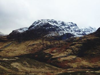 Scenic view of snow covered mountains