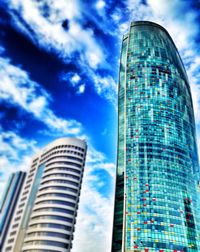 Low angle view of modern buildings against sky