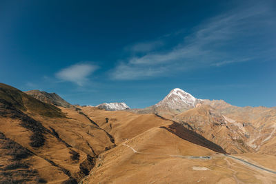 Colorful mountain landscape view with vivid blue sky in europe.