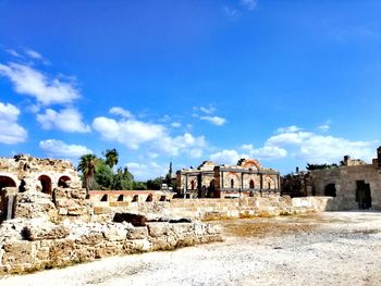 Old ruin building against cloudy sky