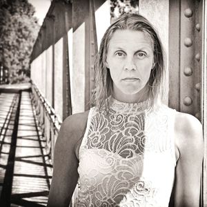 Portrait of woman on bridge