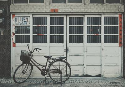 Bicycle against building