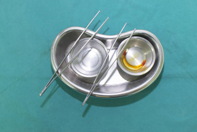 High angle view of tea in container on table