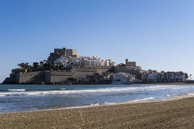 Old town of peniscola, castellón is a major tourist attraction on the spanish mediterranean coast.