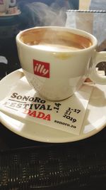 Close-up of coffee cup on table