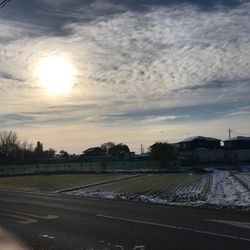 Empty road against sky