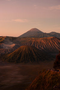 Scenic view of mountains against sky during sunset