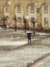 Woman walking in building