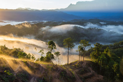 Scenic view of mountains against sky during sunset