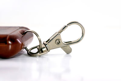 Close-up of eyeglasses on table against white background