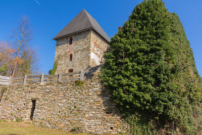 Low angle view of historical building against sky