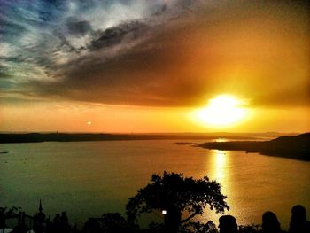 Scenic view of sea at sunset