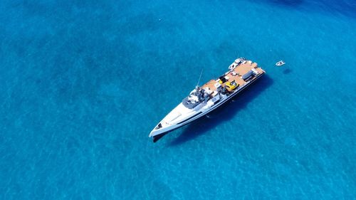 High angle view of ship sailing in sea