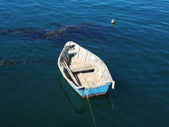 High angle view of boat moored in lake