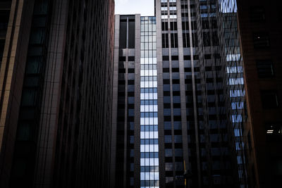 Low angle view of modern buildings in city