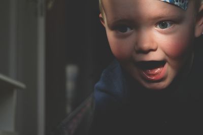 Close-up of boy looking away