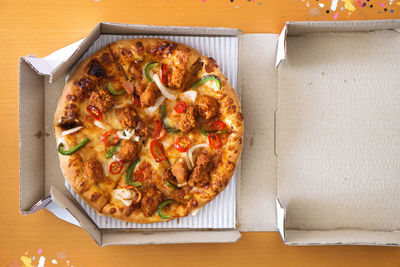 High angle view of pizza on table