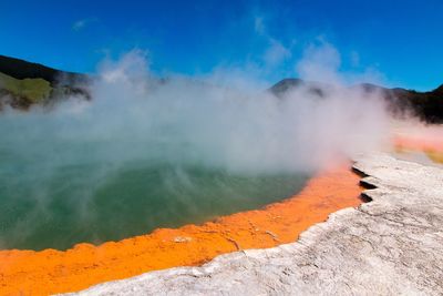 Scenic view of volcanic landscape against sky