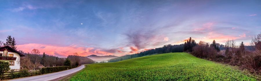 Road amidst landscape against sky