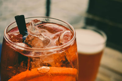 Aperol spritz with friends on table. 