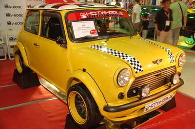 View of yellow car on street