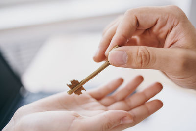 Close-up of person holding hands